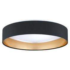 a black and gold circular light fixture