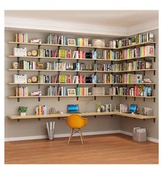 a room with several bookshelves and a yellow chair in front of the bookcase