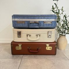 Fabulous Authentic Vintage Suitcases! These suitcases were made between the 1950s and 1960s.  Use as an actual suitcase or stack with other vintage suitcases as beautiful mid-century or farmhouse decor!  SOLD INDIVIDUALLY - Select your favorite or buy more than one and stack them! A) Blue Marbled Suitcase - Has 2 keys! 20 1/2" x 5 3/4" x 15 1/2" B) White Suitcase - 21" x 6" x 16 1/4" C) Brown Suitcase - Beautiful Green Gingham Interior! 21" x 6 1/2" x 13 3/4"  Condition: The vintage suitcases are in great condition for their age. These are vintage suitcases, so they may have marks, interior cosmetic staining or wear as well. Their latches could be a little finicky, but all are unlocked and open and close. Keys come with the blue suitcase, but not with the white or brown case. ZOOM IN ON AL Wedding Thrift, Gingham Interior, White Suitcase, Thrift List, Blue Suitcase, Cute Suitcases, Vintage Suitcases, Green Gingham, Vintage Suitcase