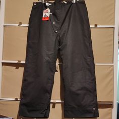 Vintage Globe Black Firefighter Lined Pants Men's 40 Measures Approx: Waist 20" X Rise 15.5" X Hips 24.5" X Inseam 27" New Old Stock Black Parachute Pants With Belt Loops For Outdoor Activities, Black Parachute Pants For Outdoor Activities, Winter Outdoor Pants With Belt Loops, Black Military Cotton Pants, Black Military Straight Leg Pants, Black Military Style Cotton Pants, Black Biker Workwear Pants, Military Style Black Outdoor Bottoms, Black Military Bottoms For Outdoor