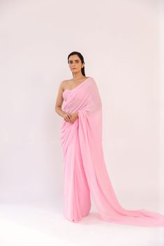 Featuring a baby pink pre-stitched saree in gorgette base. It is paired with a bandeau. Color: PINK FABRIC: GEORGETTE Delivery time 15 to 20 days Georgette Plazo, Sweetheart Neck Blouse, Mukesh Work, Look Wide Leg, Stitched Saree, Desi Love, Pink Wrap, Indian Fashion Dresses, Traditional Sarees