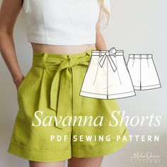 a woman wearing shorts and a white top with the words savannah shorts sewing pattern on it