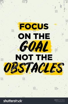 the words focus on the goal not the obstacles in black and yellow colors with grungy