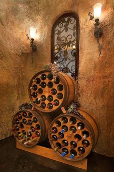 three wine barrels stacked on top of each other