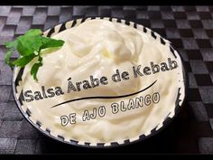 there is a bowl that has some food in it and the words salsa arabe de kebab on it