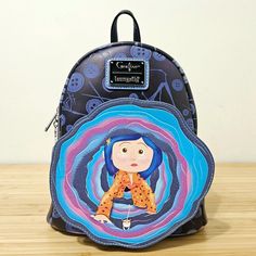 Loungefly Coraline Glow in the Dark Mini Backpack New Brand new with tags and a defect on the back (Thin scratch on the back) Please see picture #8. Exclusvie  Glows in the Dark 2 side pockets Size: Mini / Approx 10.5" H x 9" W x 4.5" D Carry all your essentials in style with this Coraline mini backpack! This small backpack is perfect for any outing and has plenty of space for all your essentials for day or night.Our reputation is extremely important, and we are devoted to ensure you can buy with full confidence Any questions feel free to contact us Coraline Backpack, Coraline Loungefly, Coraline Merch, Coraline Stuff, Middle Space, Lounge Fly, Scary Drawings