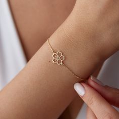 This delicate and elegant bracelet is made with high-quality 14k gold and features a real gold cherry blossom charm. The bracelet is also adorned with a dainty sakura flower charm and a birth flower charm, making it a unique and personal gift for any occasion. This bracelet makes a perfect gift for any occasion, from a birthday to a graduation to a wedding. It is a unique and personal gift that the recipient will cherish for years to come. D E T A İ L S * Material: 14k Solid Gold (Real Solid Gol Cute Flower Bracelet, Delicate Yellow Gold Flower Bracelet, Elegant Yellow Gold Bracelets With Flower Charm, Dainty Yellow Gold Bracelet With Flower Charm, Elegant Yellow Gold Bracelet With Flower Charm, Dainty Rose Gold Bracelet With Flower Charm, Dainty Rose Gold Flower-shaped Bracelets, Dainty Rose Gold Flower Bracelets, Dainty White Gold Flower Bracelet