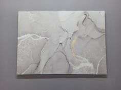 an abstract painting with white and grey colors