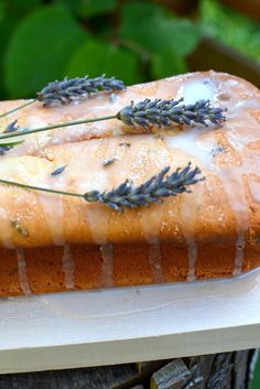 a loaf of bread with lavender sprigs on top