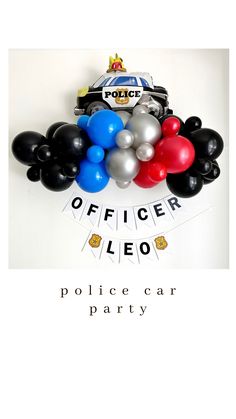 a police car balloon decoration with balloons