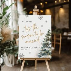 an easel with a sign that says tis the season to be married