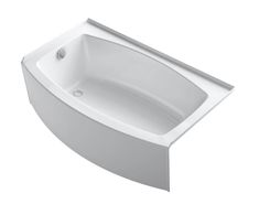 a white bath tub sitting on top of a counter