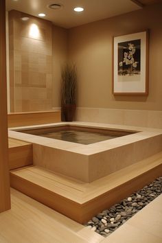 an indoor hot tub surrounded by rocks and stones in a room with wood trimmings