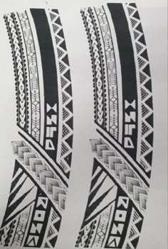 two black and white designs on paper