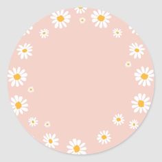 a pink circle with white daisies on it