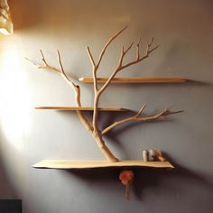 a tree shelf with two shelves on each side and one branch hanging from the wall