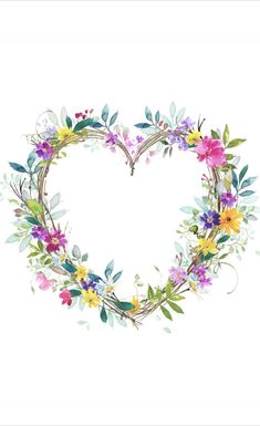 a heart shaped wreath with flowers and leaves