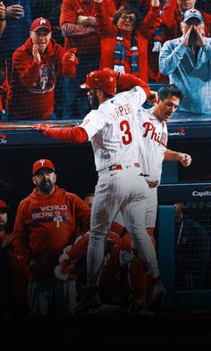 a baseball player holding his arm out in front of the crowd