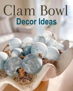 Clam Bowl Decor Ideas | Coastal Bowls | Giant Clam Shells Beachy Living Room Coastal Style, Bowl Decor Ideas, Large Clam Shell, Shell Bowls, Beachy Living Room, Diy Coastal Decor, Shell Centerpieces, Beach Centerpieces