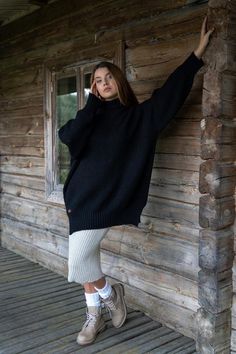 Hand knitted oversized silhouette womens sweater will suit you all year around. Garment is made of high quality yarns like merino wool & alpaca wool. Cosy plus size pullover sweater features a high neck, long puffy sleeves with ribbed details on the cuffs, two side splits delivers an effortless look which will match with your favourite jeans or skirt. Minimalist leather label brings a lovely handmade product touch.Natural wool yarns will keep you nice & cosy because it controls body temp Black Wool Oversized Sweater, Black Oversized Wool Sweater, Oversized Black Wool Sweater, Black Wool Sweater With Chunky Knit, Black Wool Chunky Knit Sweater, Black Chunky Knit Wool Sweater, High Neck Sweater Outfit, Black Sweater Outfit, Winter Mode Outfits