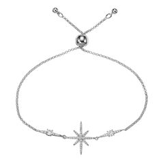 PRICES MAY VARY. Elegant bracelet with a striking North Star-shaped motif. Silver bracelet for women with a 2 cm by 2 cm North Star motif highlighted by two 18 mm stone-studded motifs. Chain bracelet with adjustable sizing through bead fastening. Stunning star bracelets for women and teen girls with a stylish bead fastening featuring the Namana logo Silver star bracelets for women and teenage girls made from Rhodium plated brass with cubic zirconia gemstones These stylish cubic zirconia bracelet Star Stud Bracelet, Fall Bracelets, Silver Star Bracelet, Silver Bracelet For Women, Simple Silver Jewelry, Dainty Gold Bracelet, Slider Bracelet, Star Motif, Silver Bracelets For Women