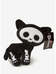 a small black and white stuffed animal