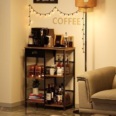 there is a coffee bar in the corner of this living room with lights strung above it