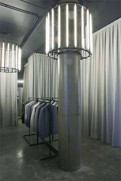 a clothing rack with shirts hanging on it