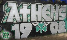 graffiti on the side of a building that says athen's1908