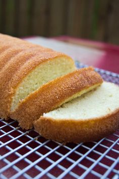 a loaf of bread sitting on top of a cooling rack