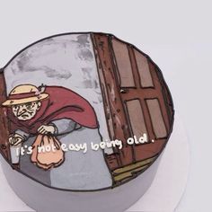 a round cake decorated with an image of a man holding a bag and the words it's necessary to say old