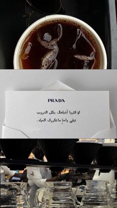 there is a sign that says prada in arabic on the side of a table