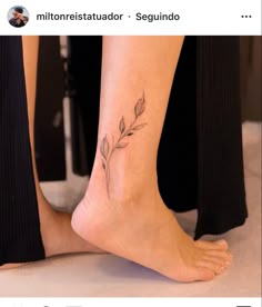 a woman's foot with a small flower tattoo on her left side calfocks