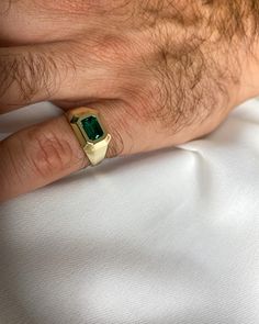 "Men emerald signet / pinky ring made from 14K yellow gold. A Modern geometric ring with a faceted structure set with a gorgeous Chatham emerald. Personalized signet ring, free engraving can be added by choice. Available also in other gold colors such as white gold or rose gold and also in 18K gold - please see all options and quoting in the drop down menu above. **Please note that personalized items can not be returned or exchanged. Thank you for your understanding.  Ring description: * Top wid Emerald Signet Ring Men, Men Emerald Ring, Men’s Emerald Ring, Men’s Pinky Ring, Green Ring Men, Men’s Ring, Men Pinky Ring, Emerald Ring For Men, Pinky Ring Mens