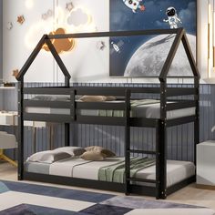 there is a bunk bed with an astronaut on the moon in the sky above it