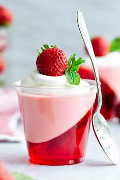 a strawberry dessert with whipped cream and fresh strawberries