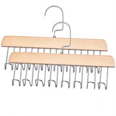 two wooden hangers with metal hooks on them