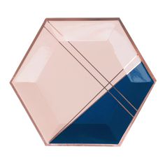 a pink, blue and white plate with lines on it's sides in the shape of an octagon