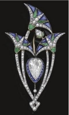 1920s Boucheron Art Deco brooch set with a pear shaped diamond surrounded by three lotus flowers with diamonds, sapphires and emeralds. Arte Art Deco, Art Deco Brooch, Nouveau Jewelry, Estilo Art Deco