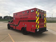 an ambulance is parked in the parking lot