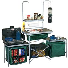 an outdoor cooking station with two trays on the top and one holding food in it