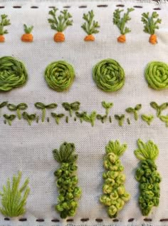 there are many different types of vegetables on this table cloth, including carrots and broccoli