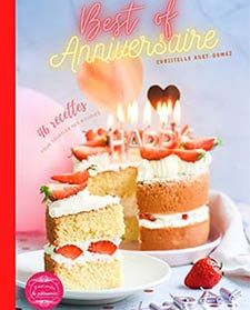 a magazine cover with cake and strawberries on the plate next to it, which reads best of anniversary