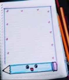 a notebook with an image of a pencil in the shape of a face on it