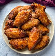 fried chicken wings on a white plate