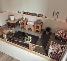 a living room filled with furniture and decor