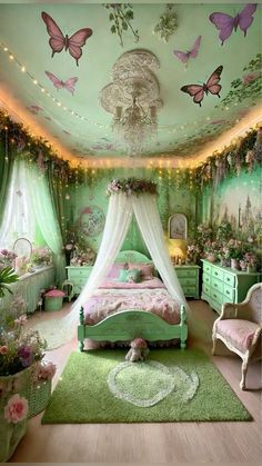 a bedroom decorated in green and pink with butterflies on the ceiling