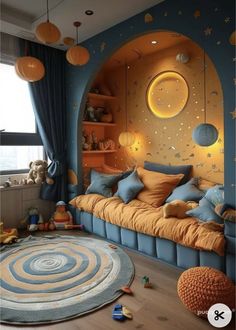 a child's bedroom decorated in blue and orange with stars on the ceiling, moon - shaped wall panels, and round rug