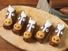 some kind of food that looks like giraffes with googly eyes on them