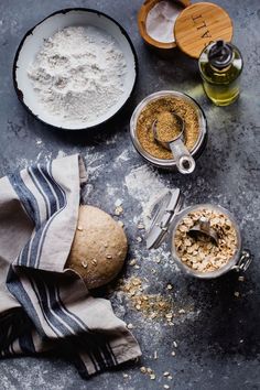 bread, flour and other ingredients on a table